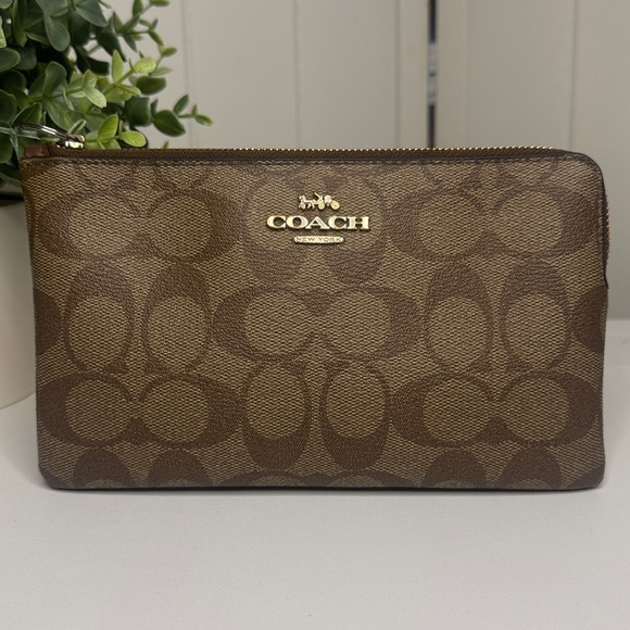 Coach Handbags - COACH®,Large Corner Zip Wristlet In Signature Canvas